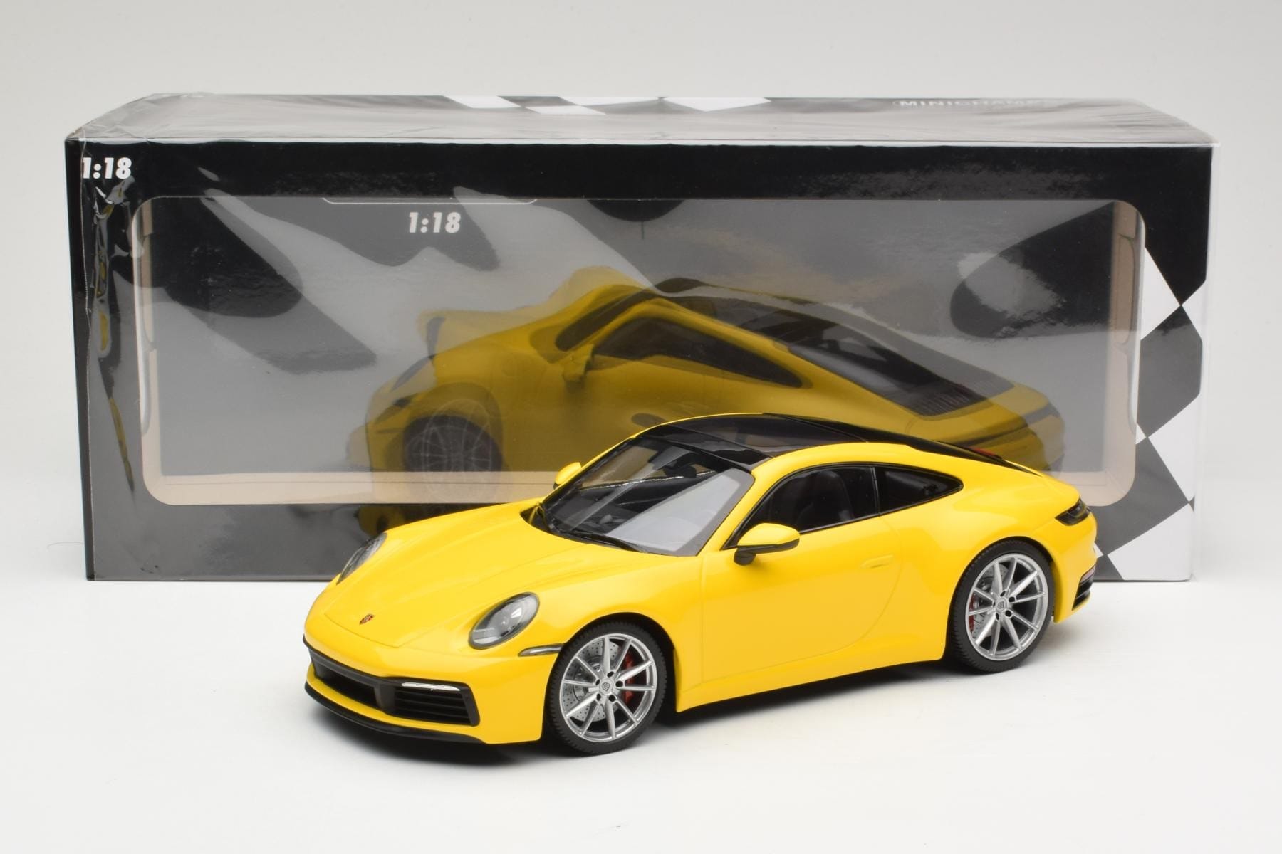 Minichamps Porsche 911 992 Carrera 4S 1:18 Yellow